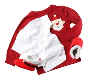 Cute Christmas baby clothes on white background, top view