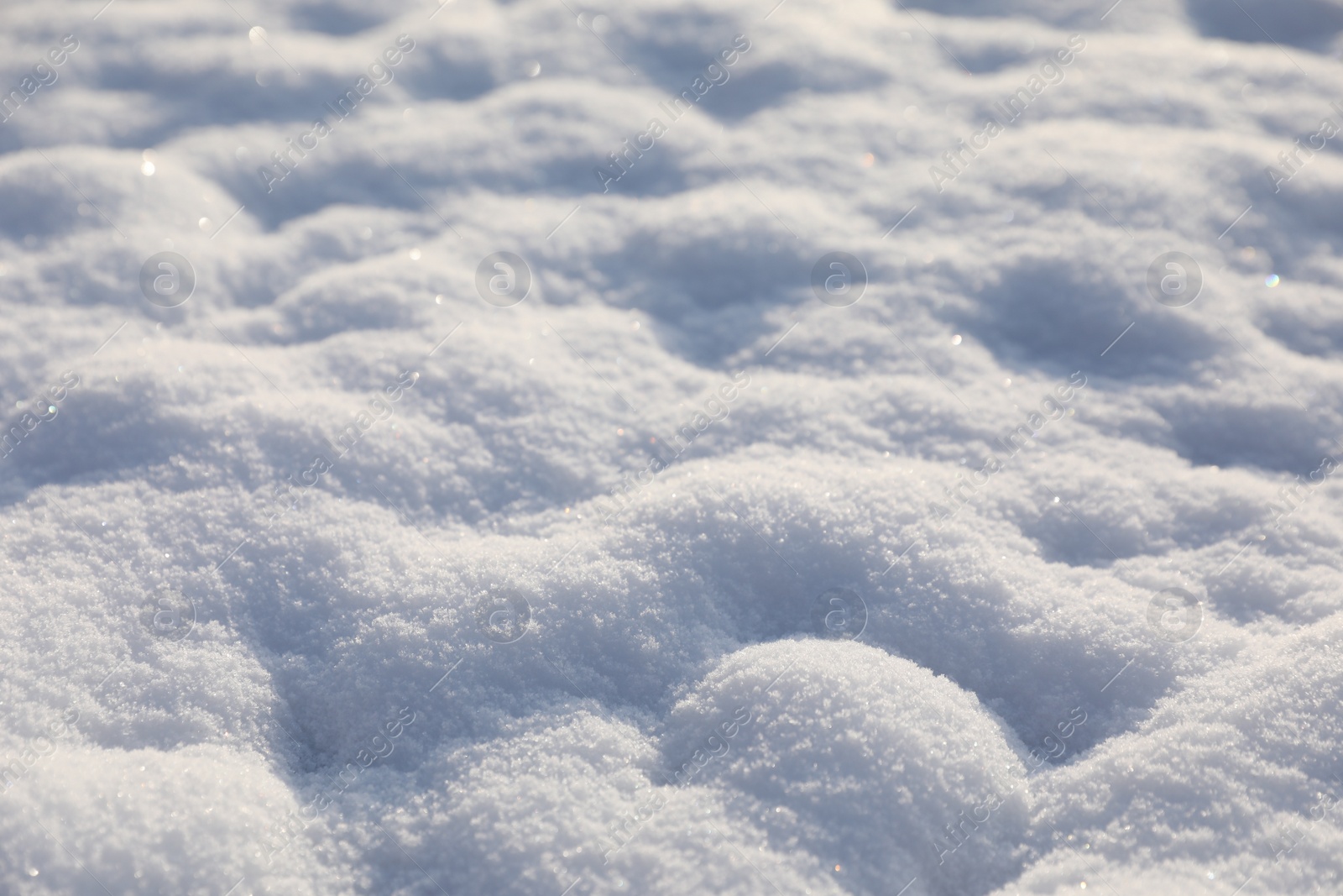 Photo of Beautiful white snow as background, closeup view