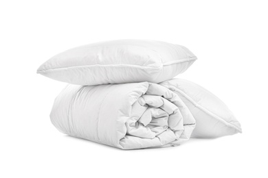 Soft blanket with pillows on white background