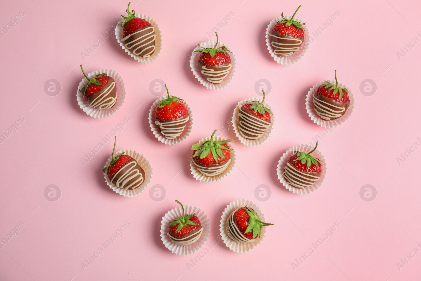 Photo of Flat lay composition with chocolate covered strawberries on color background