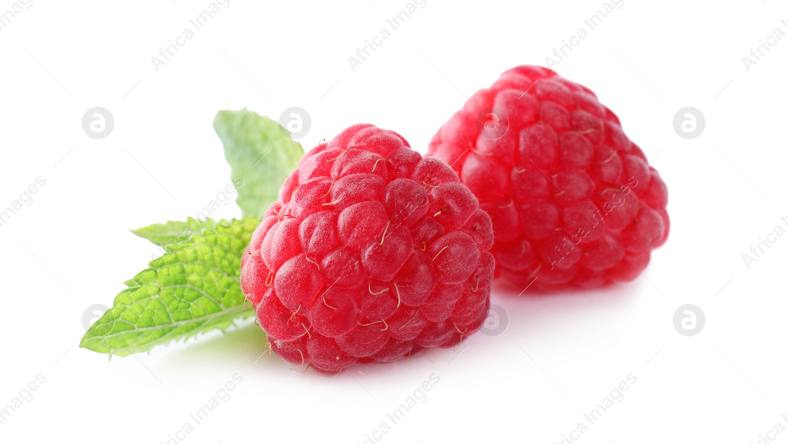 Photo of Delicious sweet ripe raspberries isolated on white