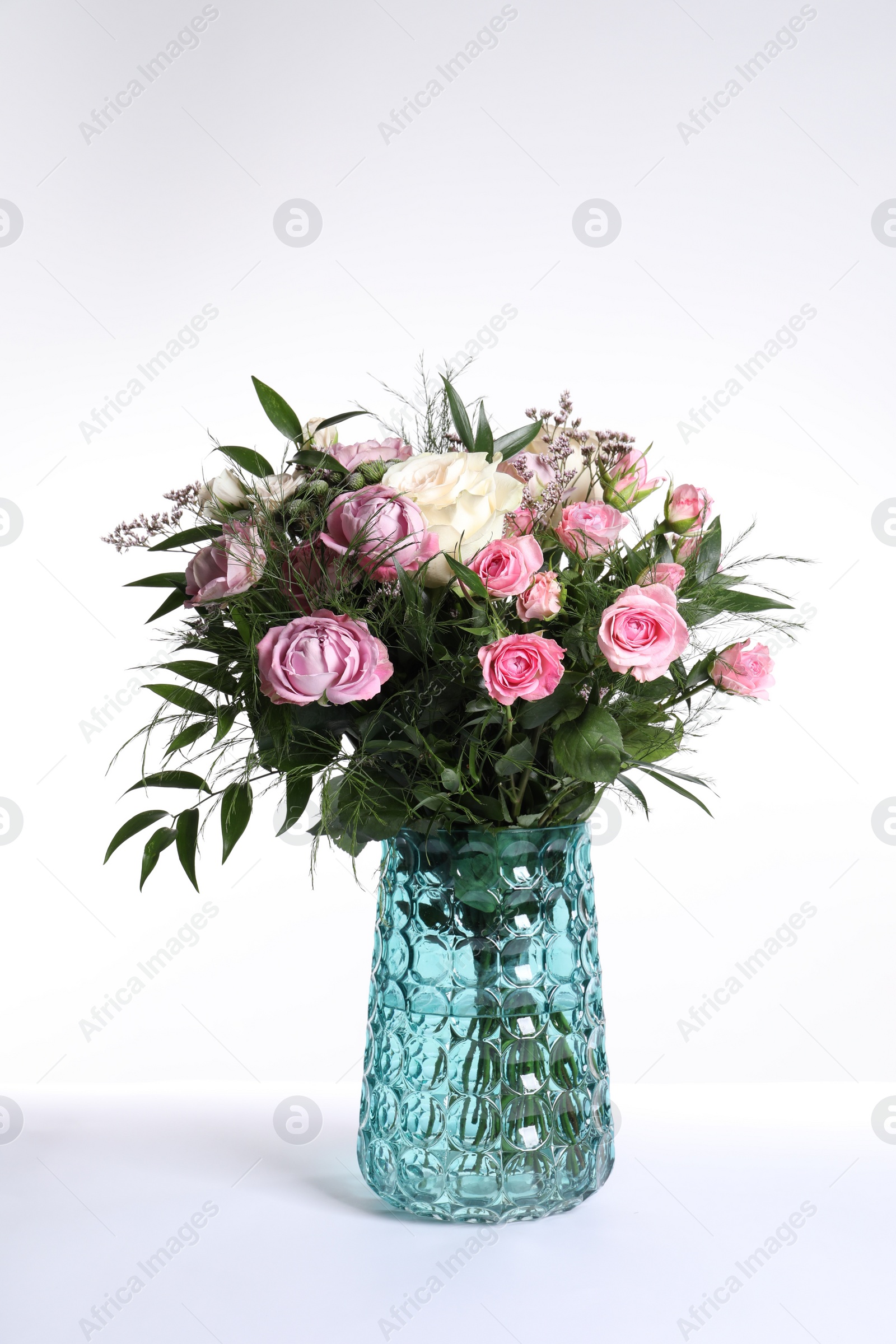 Photo of Beautiful bouquet with roses isolated on white