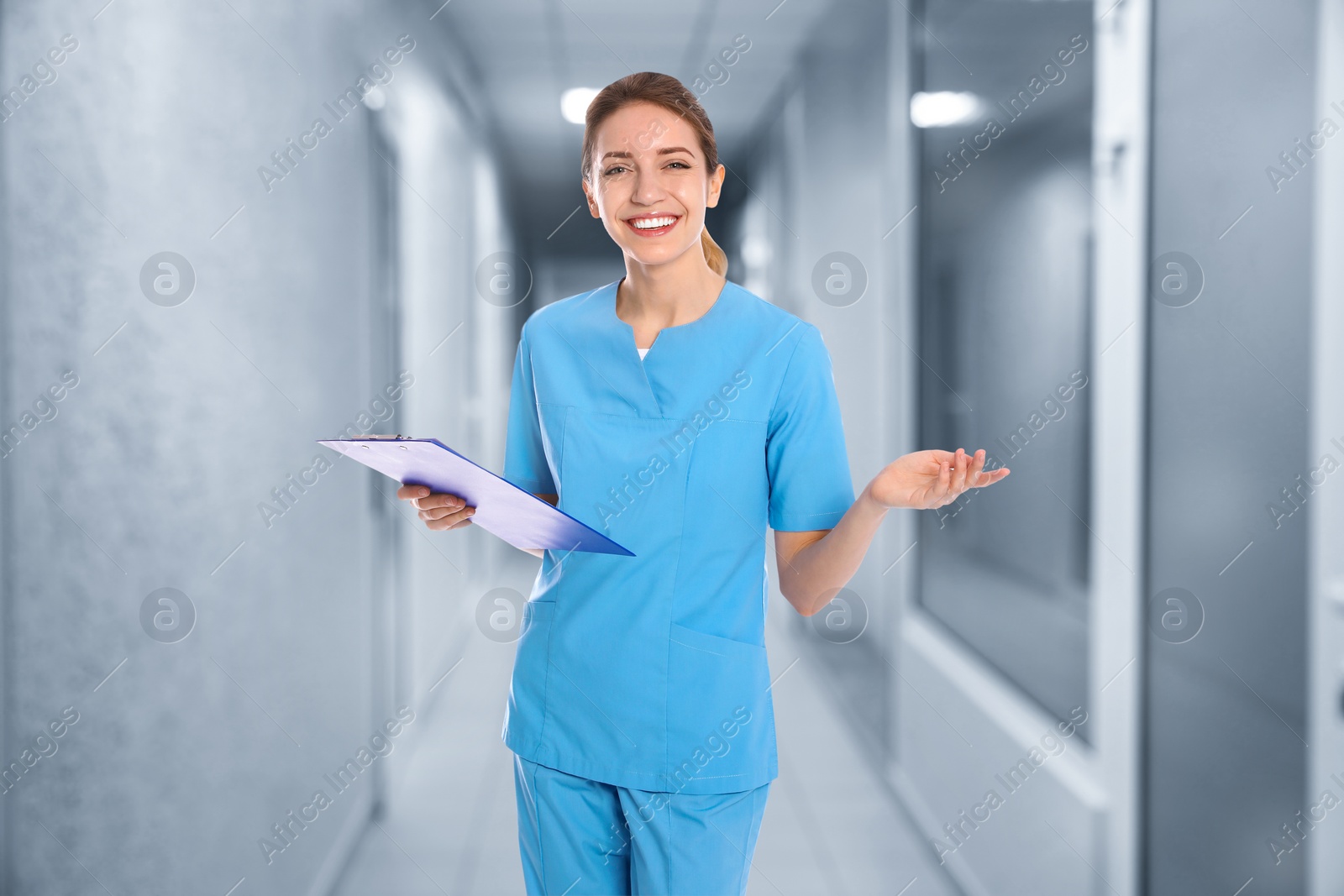 Image of Nurse with clipboard in uniform at hospital