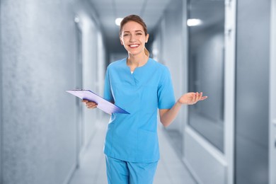 Image of Nurse with clipboard in uniform at hospital