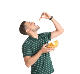 Photo of Man eating potato chips on white background