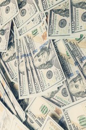 Dollar banknotes as background, closeup view. Money exchange