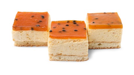 Photo of Pieces of cheesecake with jelly on white background