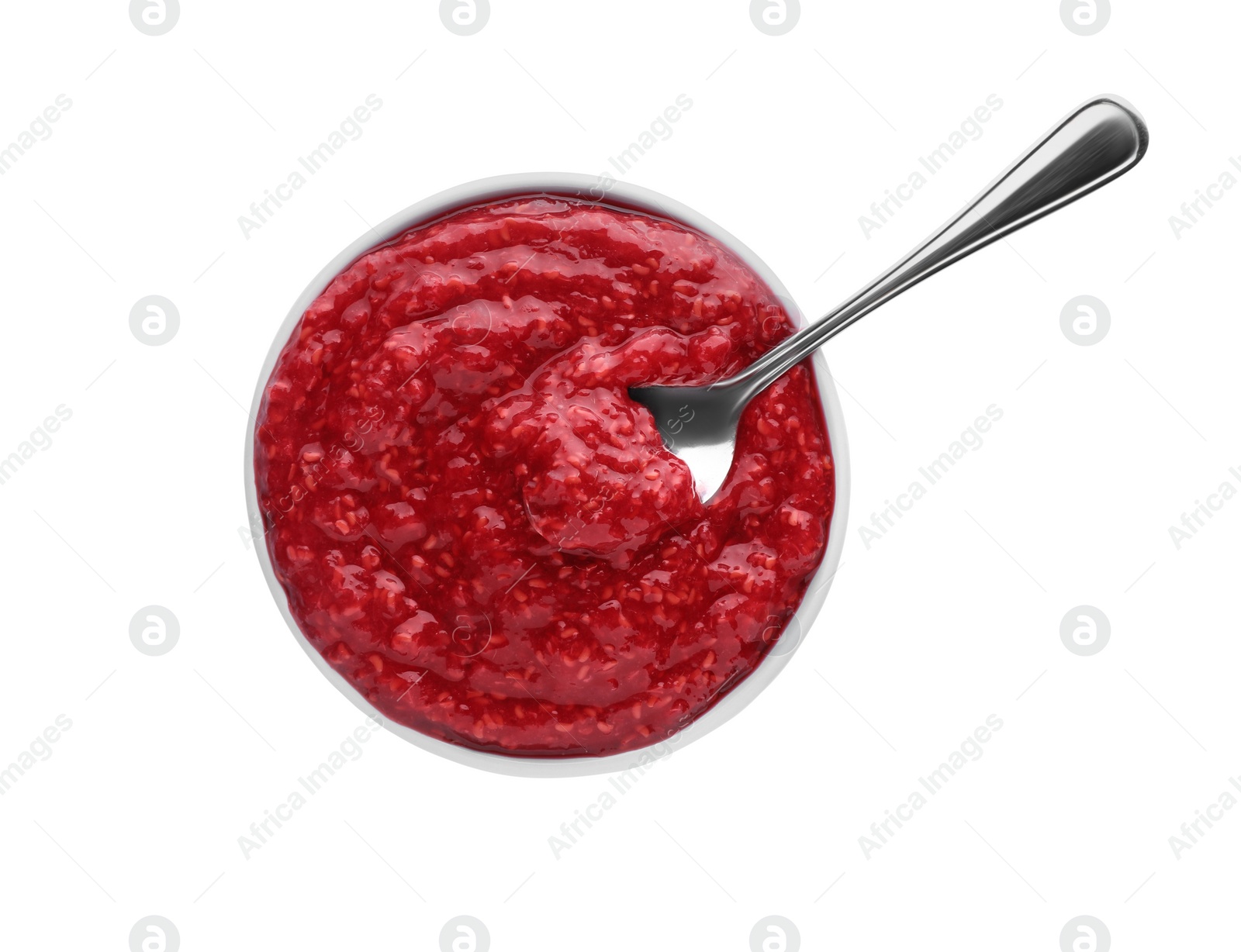 Photo of Raspberry puree in bowl on white background, top view