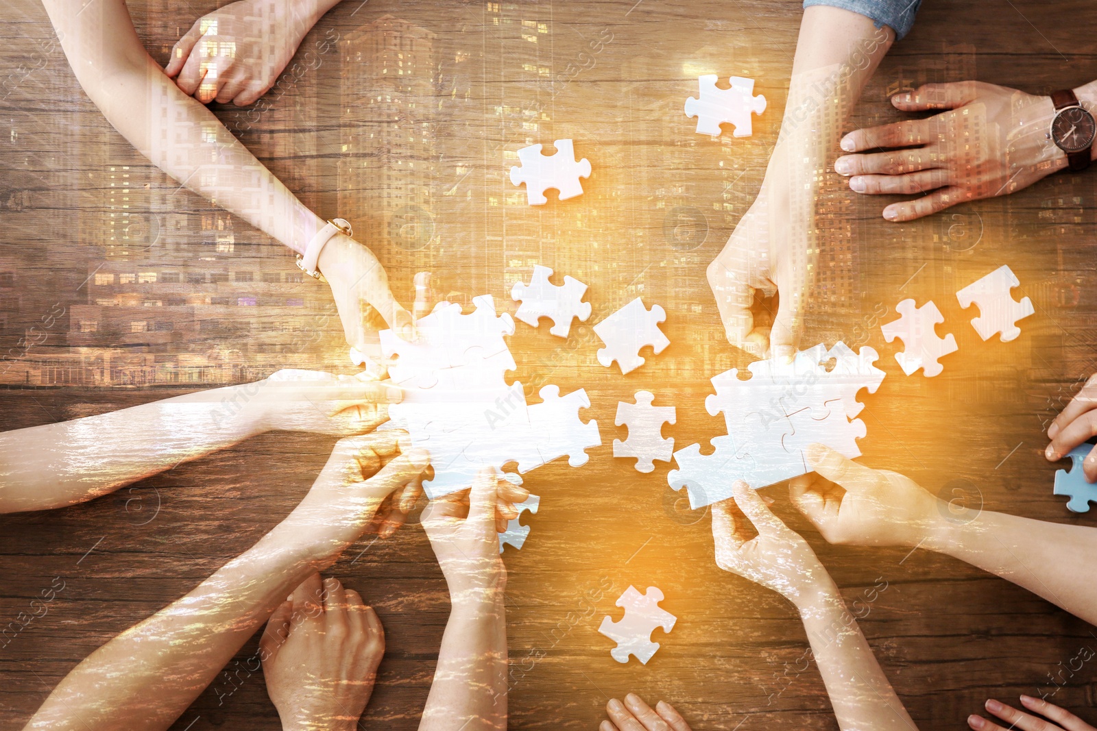 Image of Double exposure of people with puzzle and cityscape