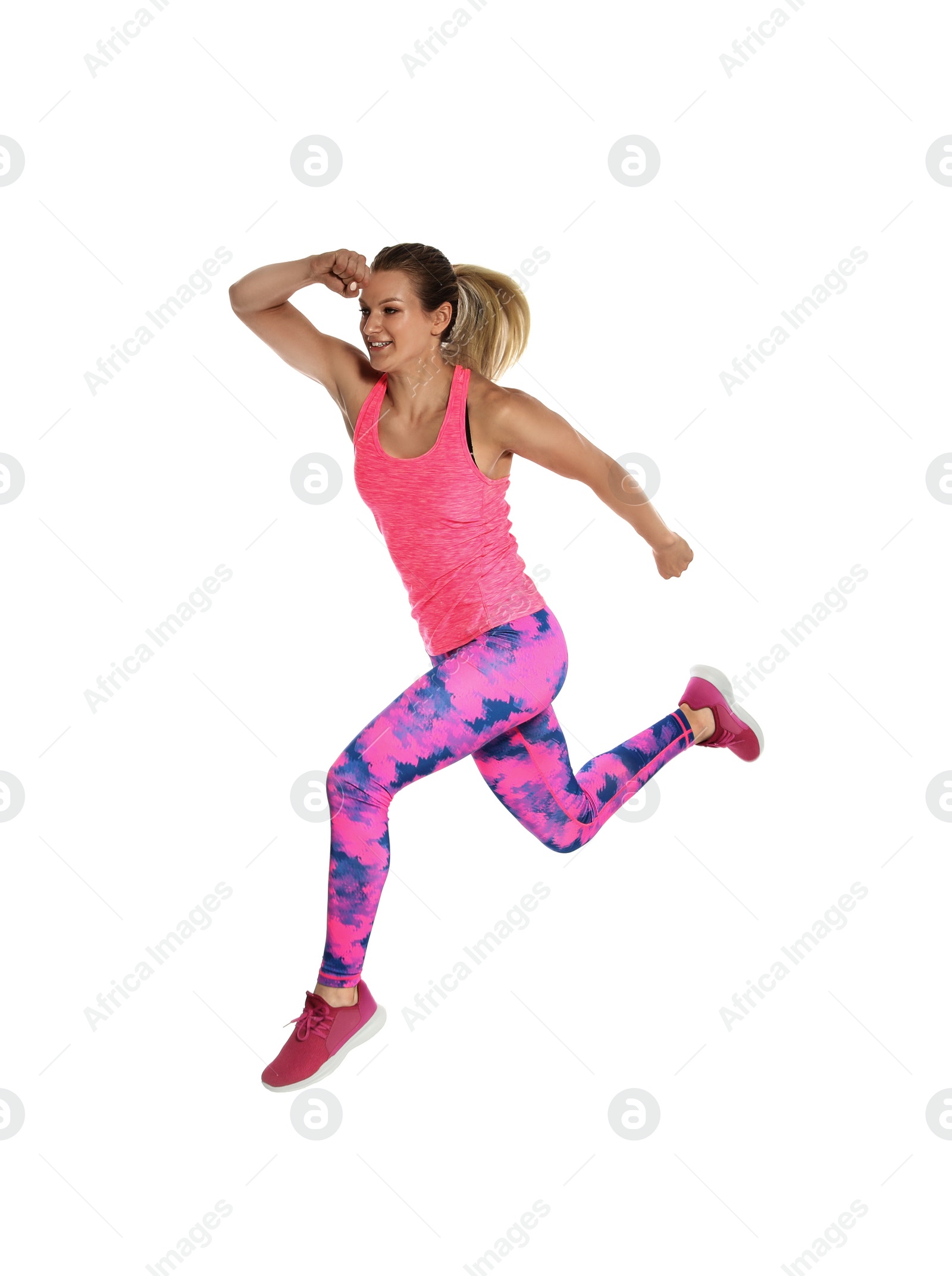 Photo of Sporty young woman running on white background