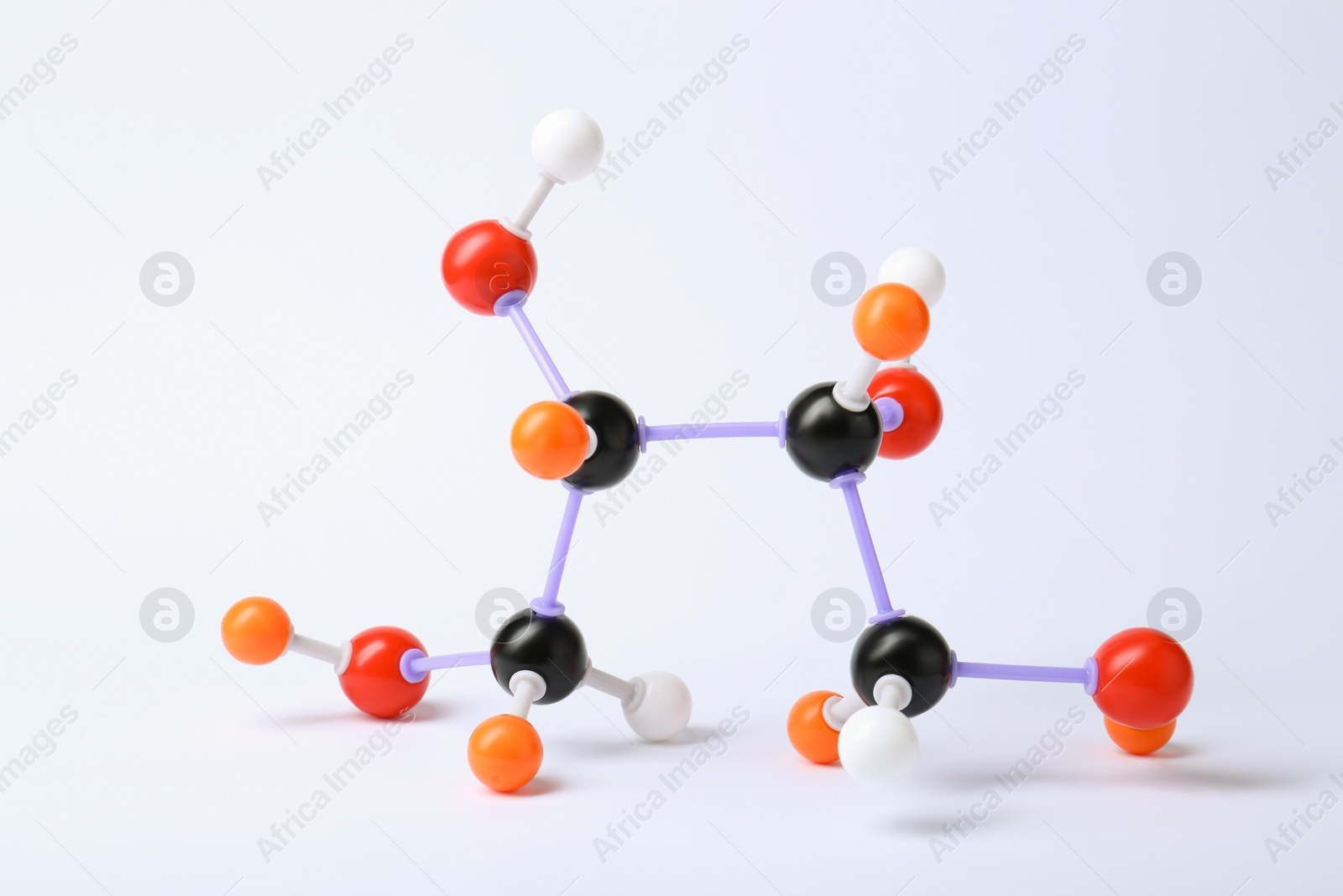 Photo of Molecule of sugar on white background. Chemical model