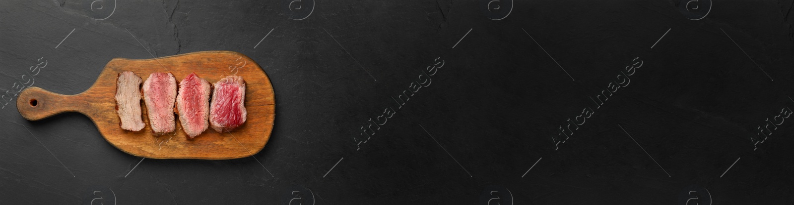 Image of Beef steak pieces with different levels of doneness on black table, top view. Banner design and space for text