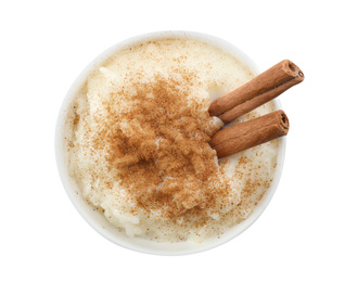 Photo of Delicious rice pudding with cinnamon isolated on white, top view