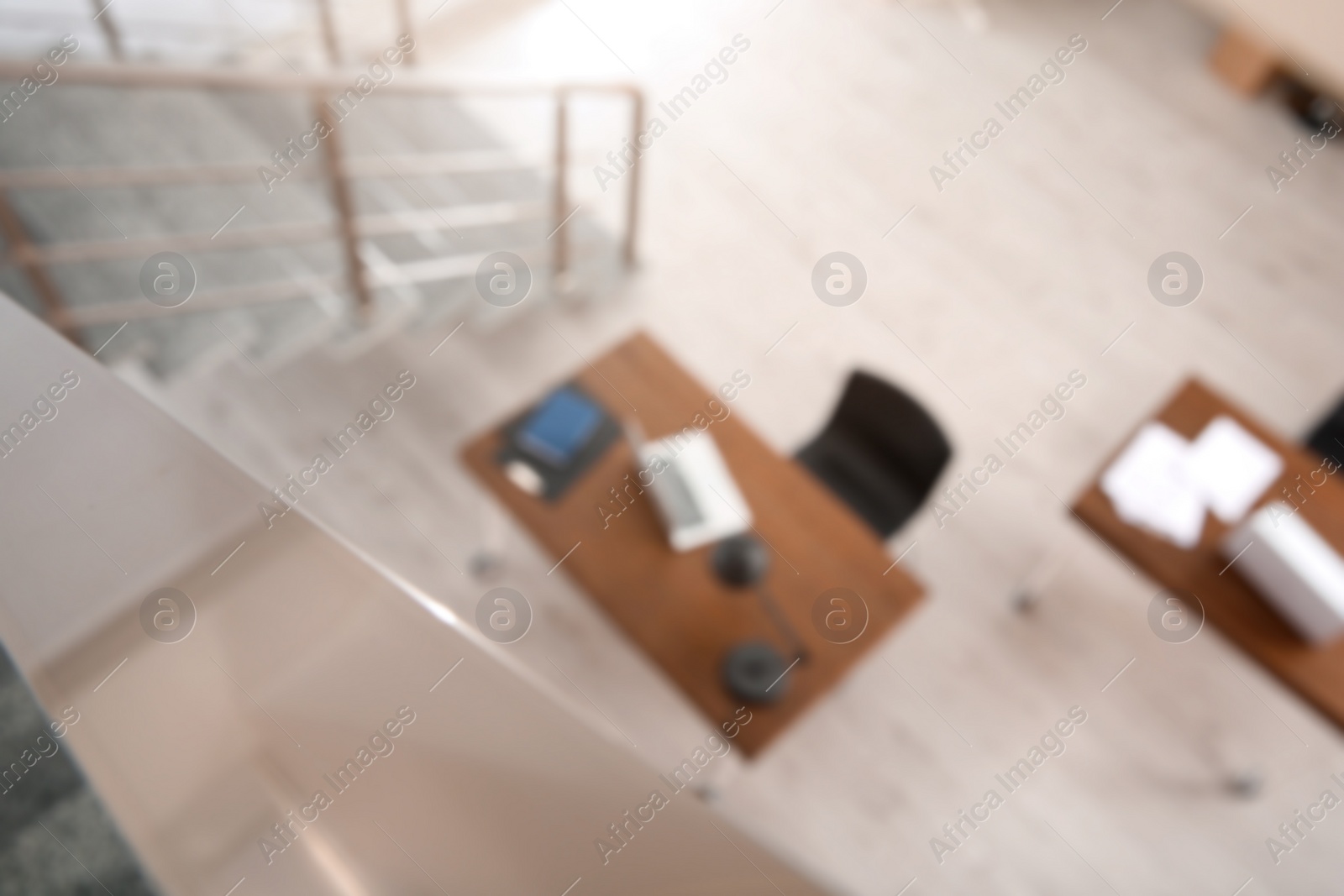 Photo of Modern brightly lit office with bokeh effect, above view