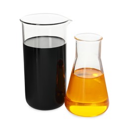 Beaker and flask with different types of oil isolated on white