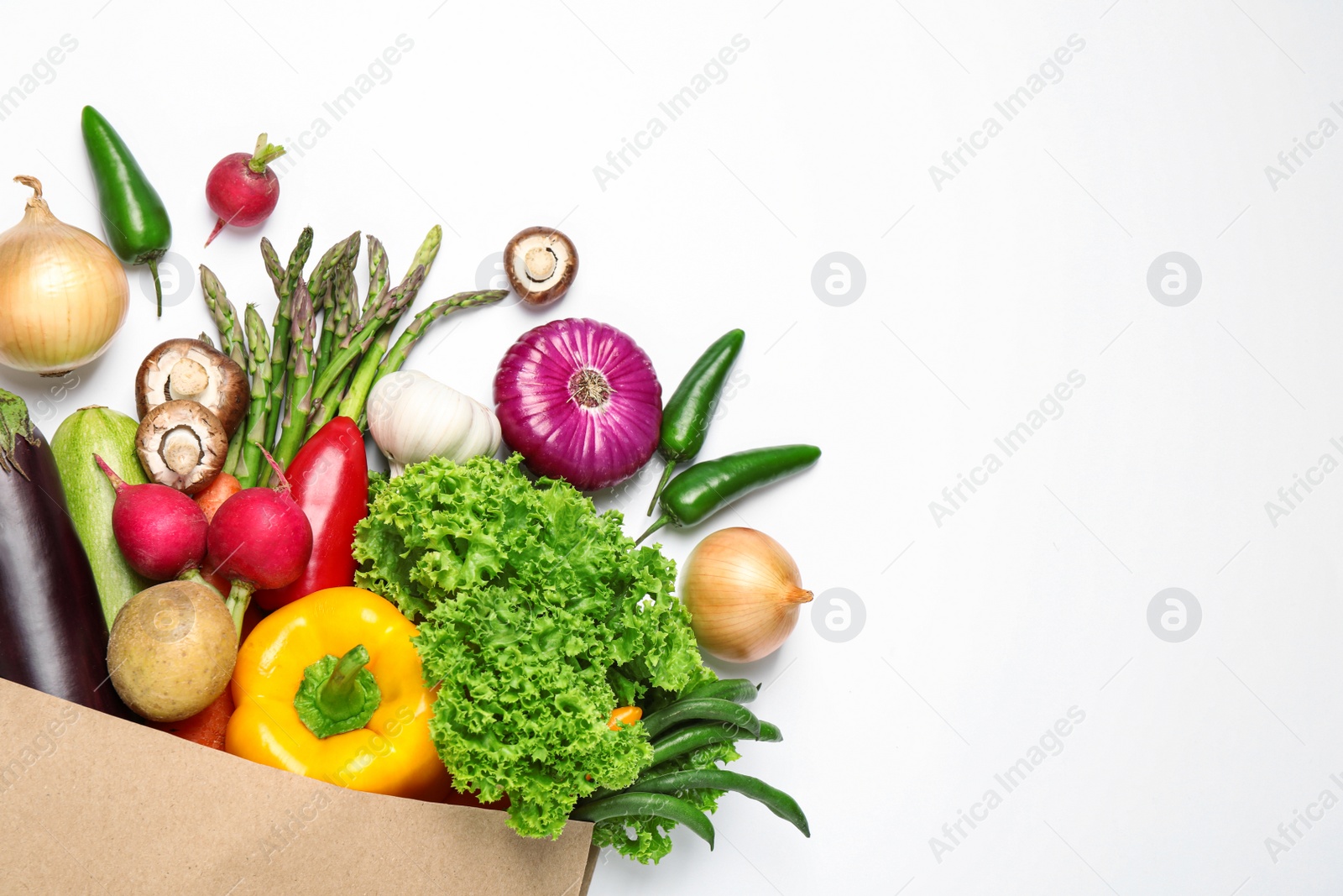 Photo of Different fresh vegetables on white background, top view