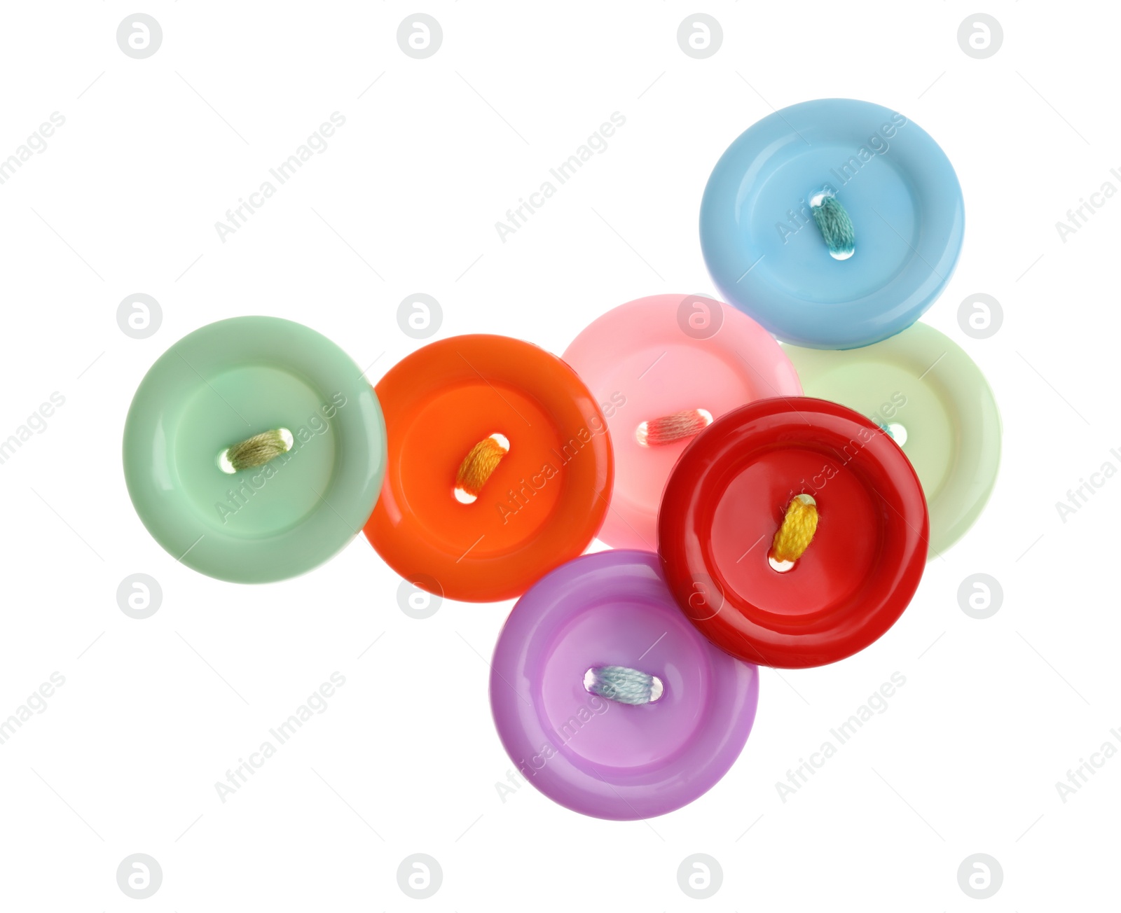 Photo of Many colorful sewing buttons on white background, top view