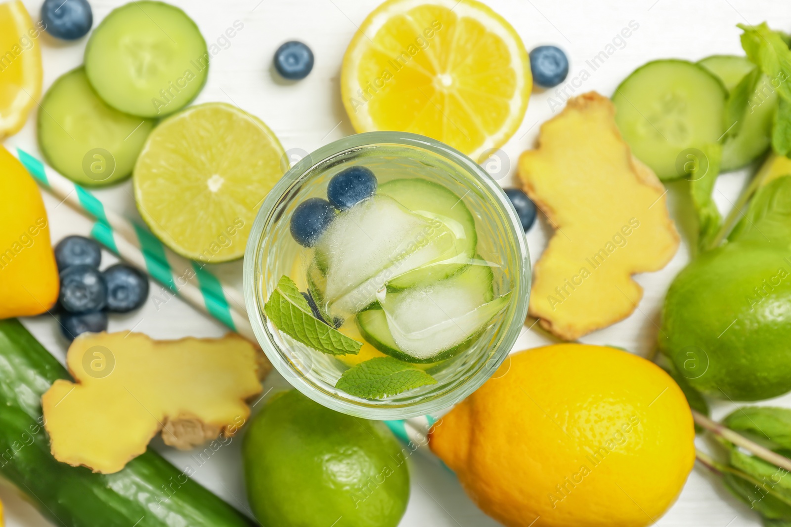 Photo of Glass with natural delicious lemonade, top view