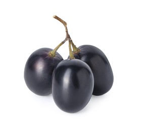 Delicious ripe dark blue grapes isolated on white