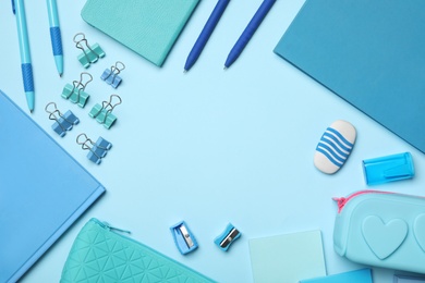 Photo of Flat lay composition with stationery on light blue background, space for text. Teacher's day