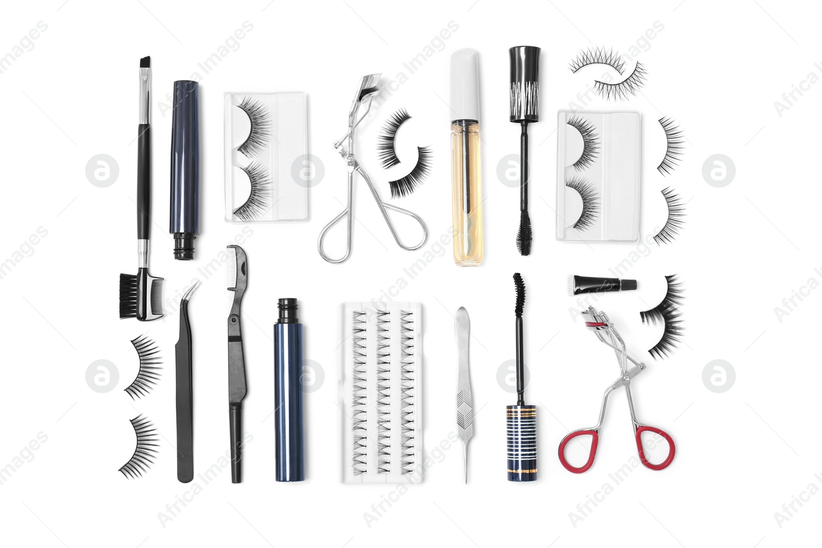 Photo of Flat lay composition with false eyelashes and cosmetic tools on white background