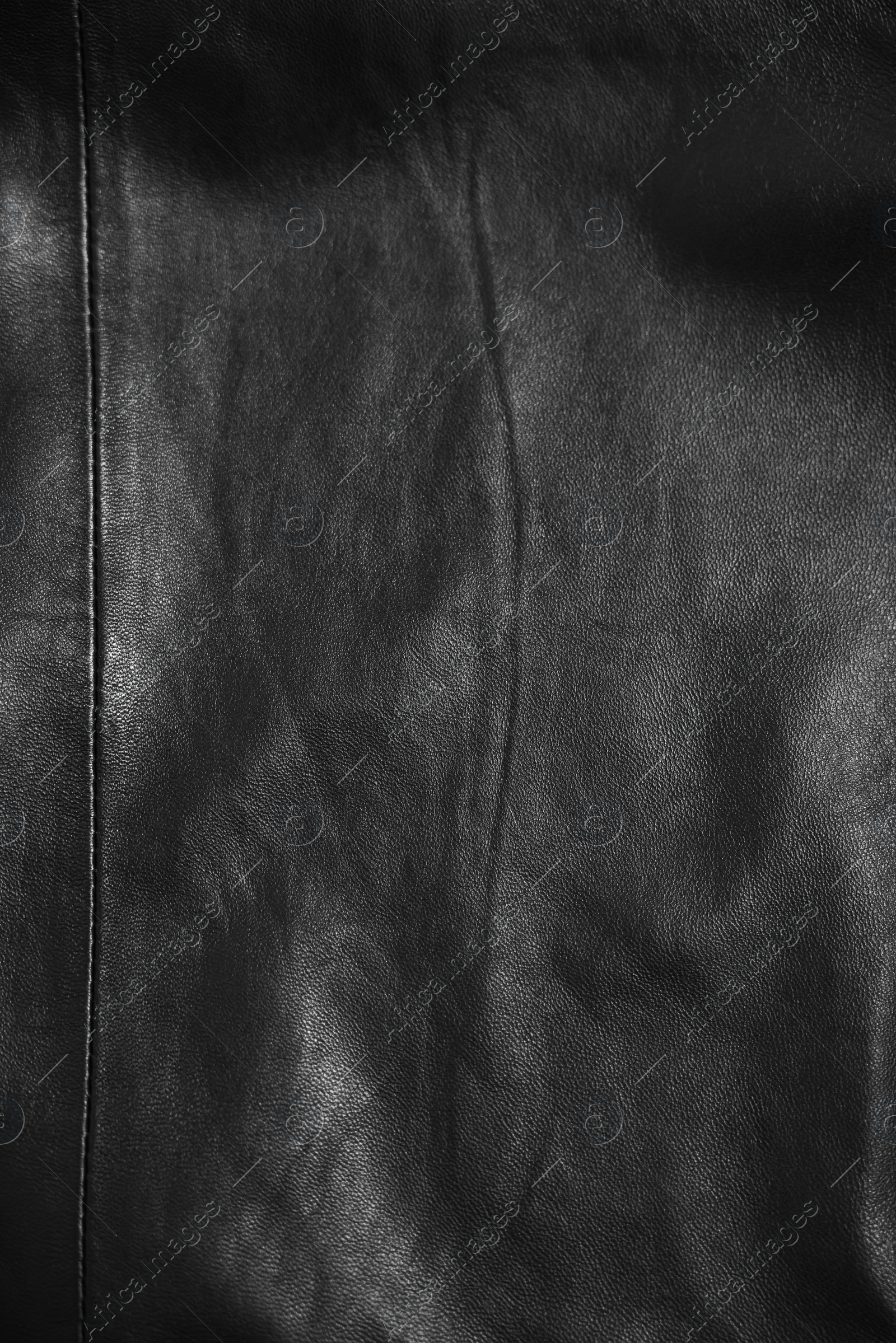Photo of Texture of black leather as background, top view