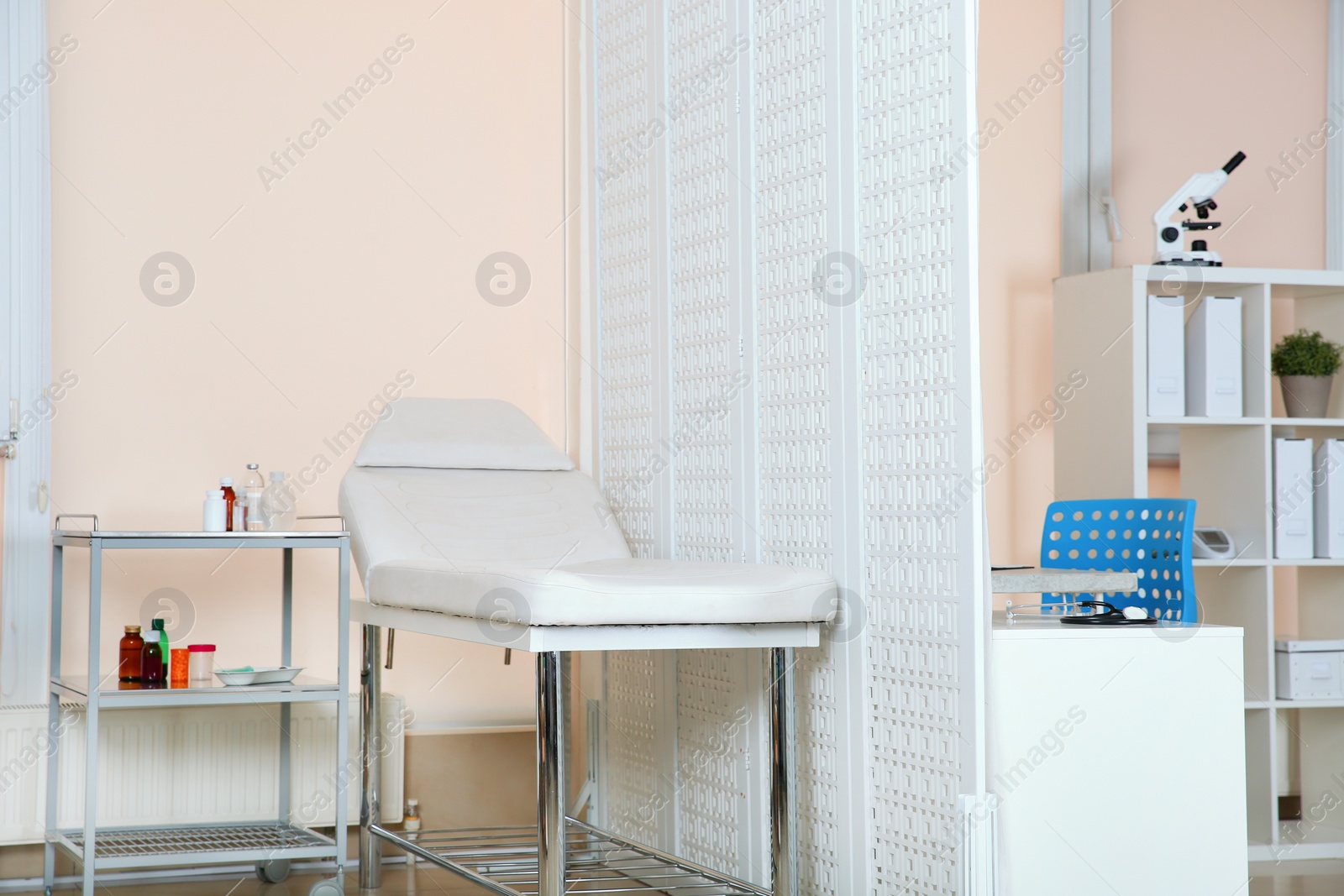 Photo of Modern interior of doctor's office with couch