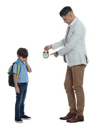 Photo of Teacher with alarm clock scolding pupil for being late against white background