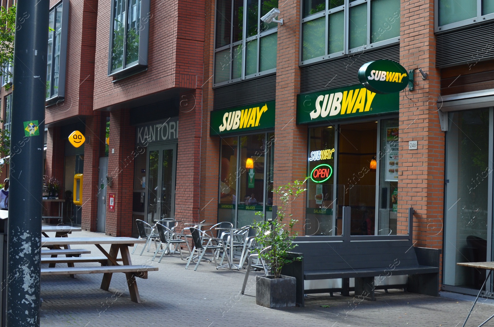 Photo of HAGUE, NETHERLANDS - SEPTEMBER 10, 2022: Restaurant Subway with outdoor terrace on city street