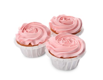 Photo of Baby shower cupcakes with pink cream on white background