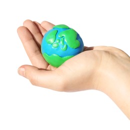 Woman holding plasticine model of planet Earth on white background, closeup