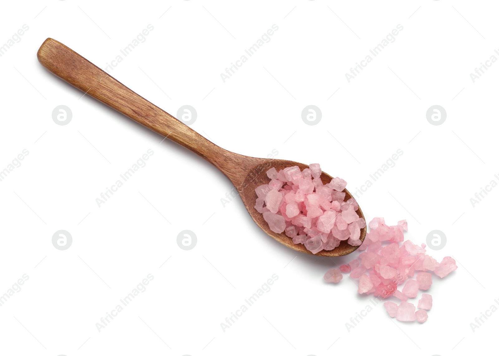 Photo of Pink sea salt and spoon isolated on white, top view