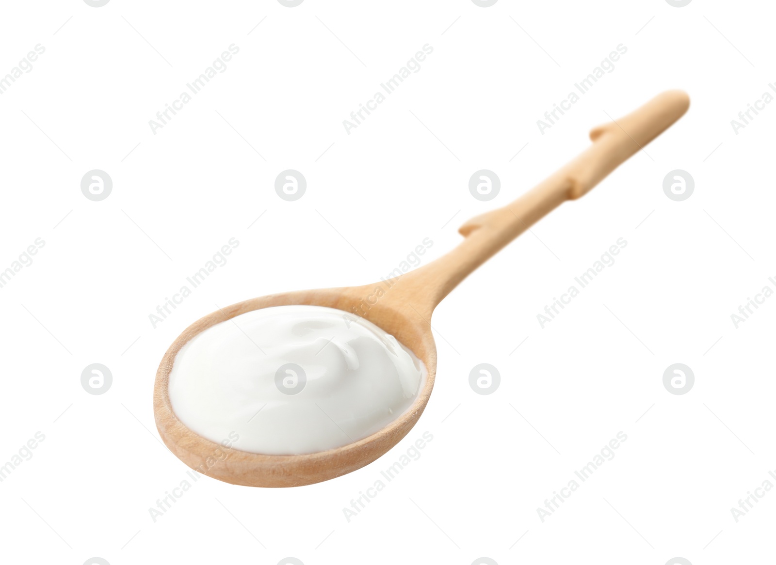 Photo of Spoon with creamy yogurt on white background