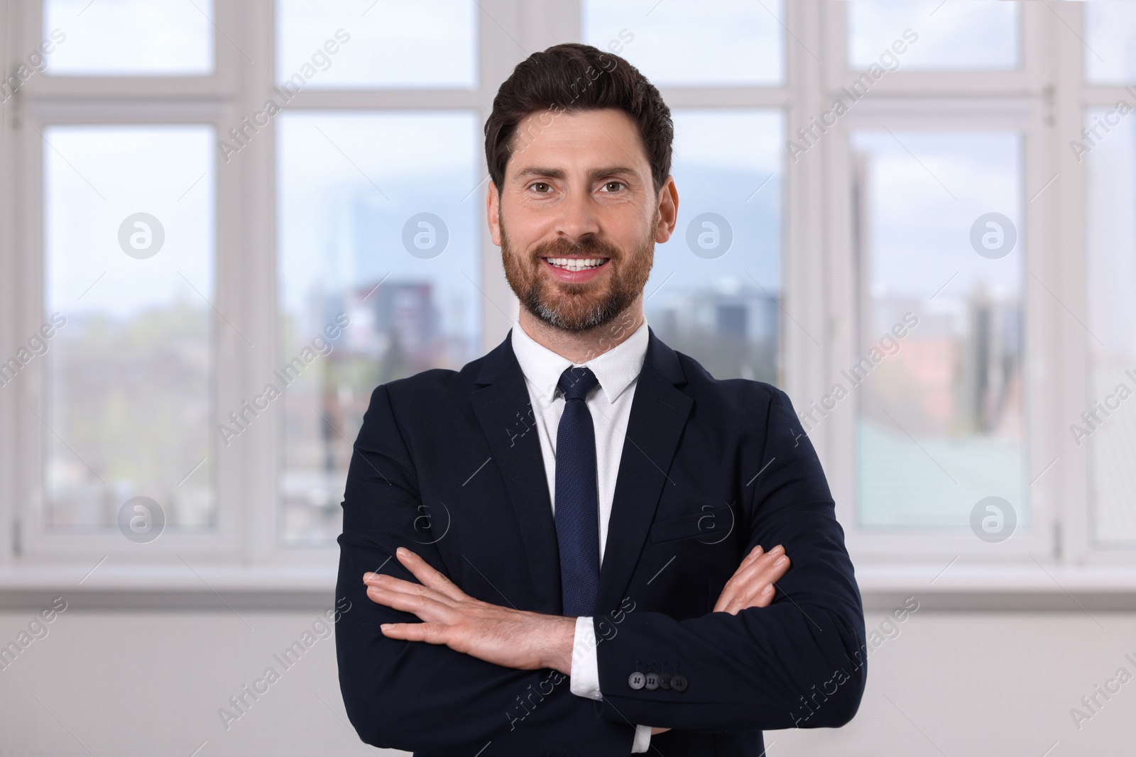 Photo of Happy real estate agent in new apartment