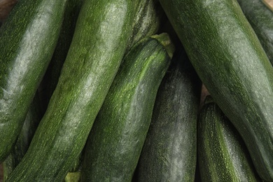 Top view of fresh ripe zucchini as background, closeup