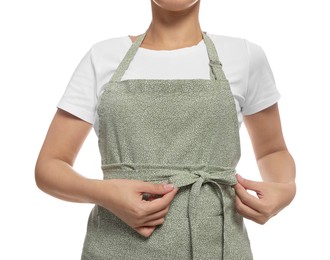 Photo of Young woman in green apron on white background, closeup