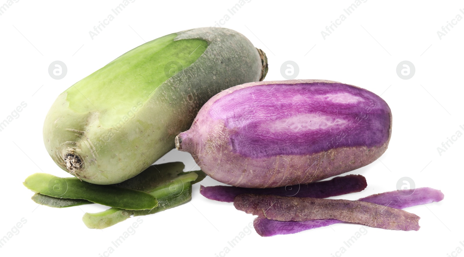 Photo of Purple and green daikon radishes isolated on white