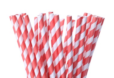 Photo of Striped paper cocktail tubes on white background