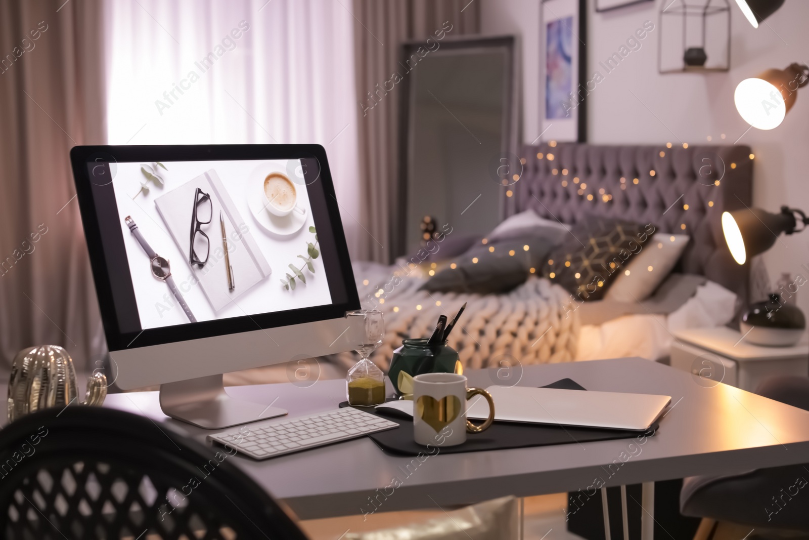 Photo of Stylish workplace interior with modern computer on desk