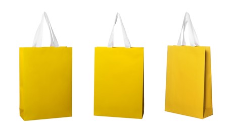 Yellow shopping bag isolated on white, different sides