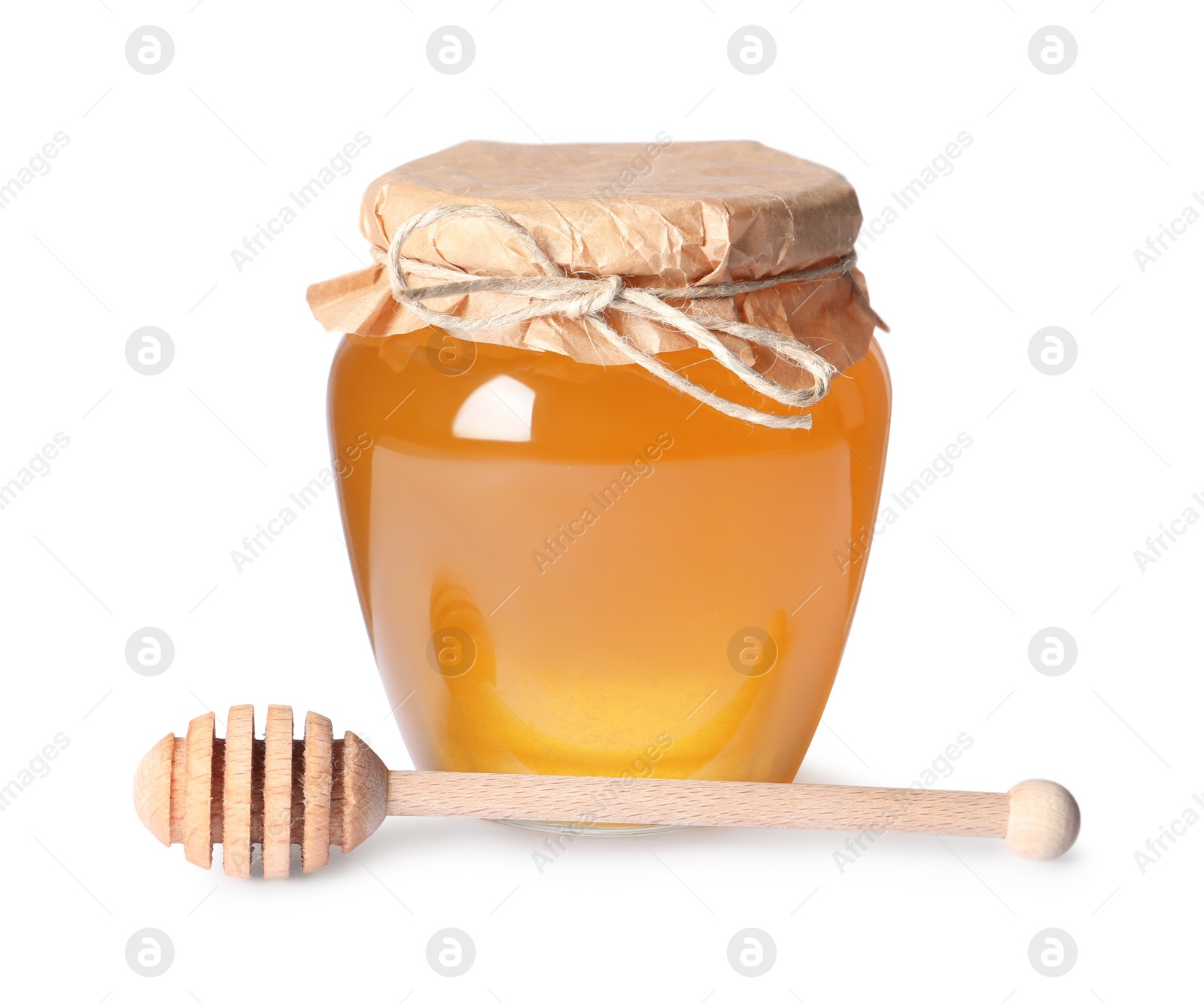 Photo of Tasty natural honey in glass jar and dipper isolated on white