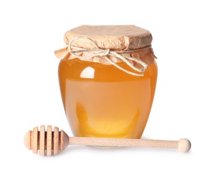 Photo of Tasty natural honey in glass jar and dipper isolated on white