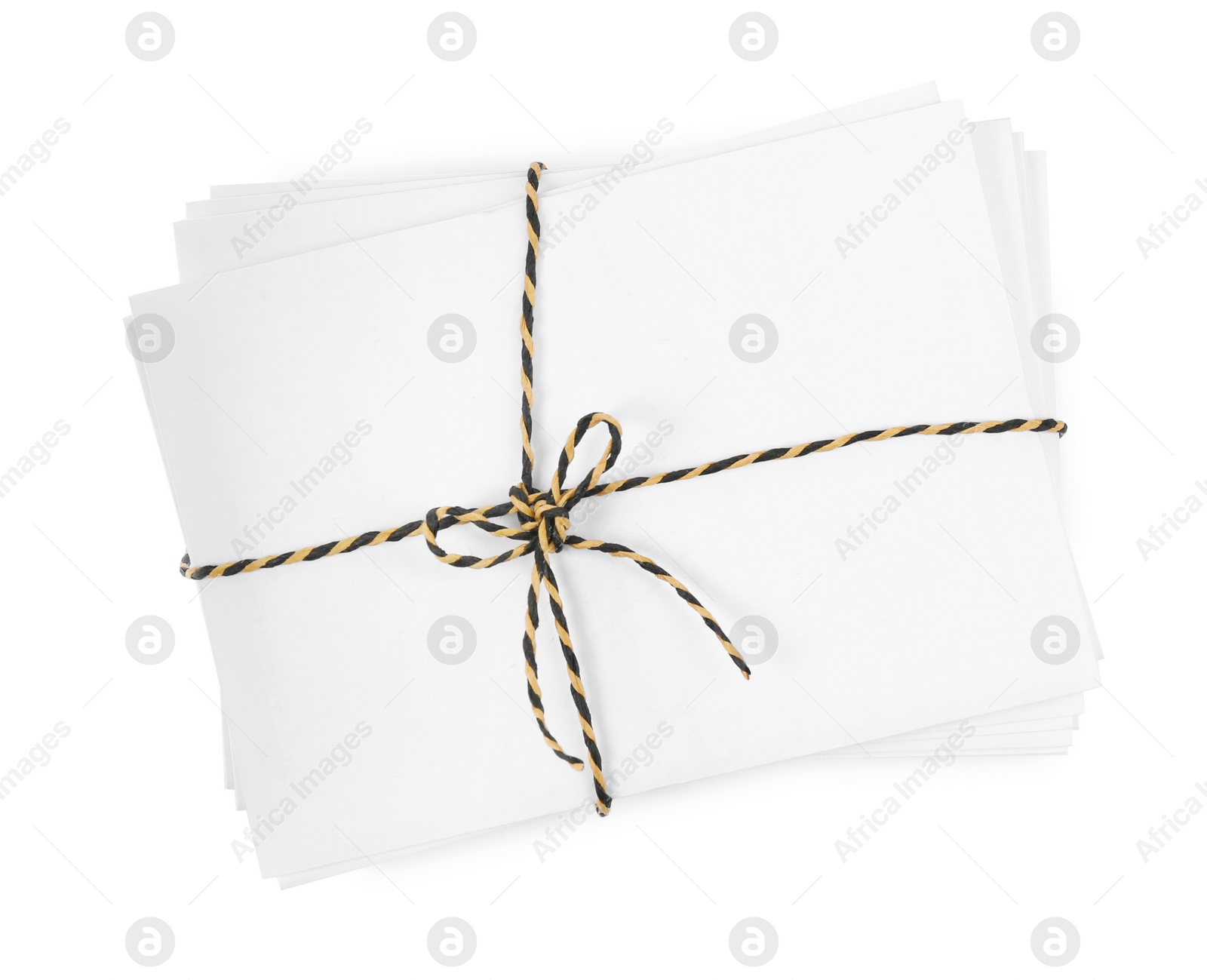 Photo of Stack of letters wrapped with rope on white background, top view