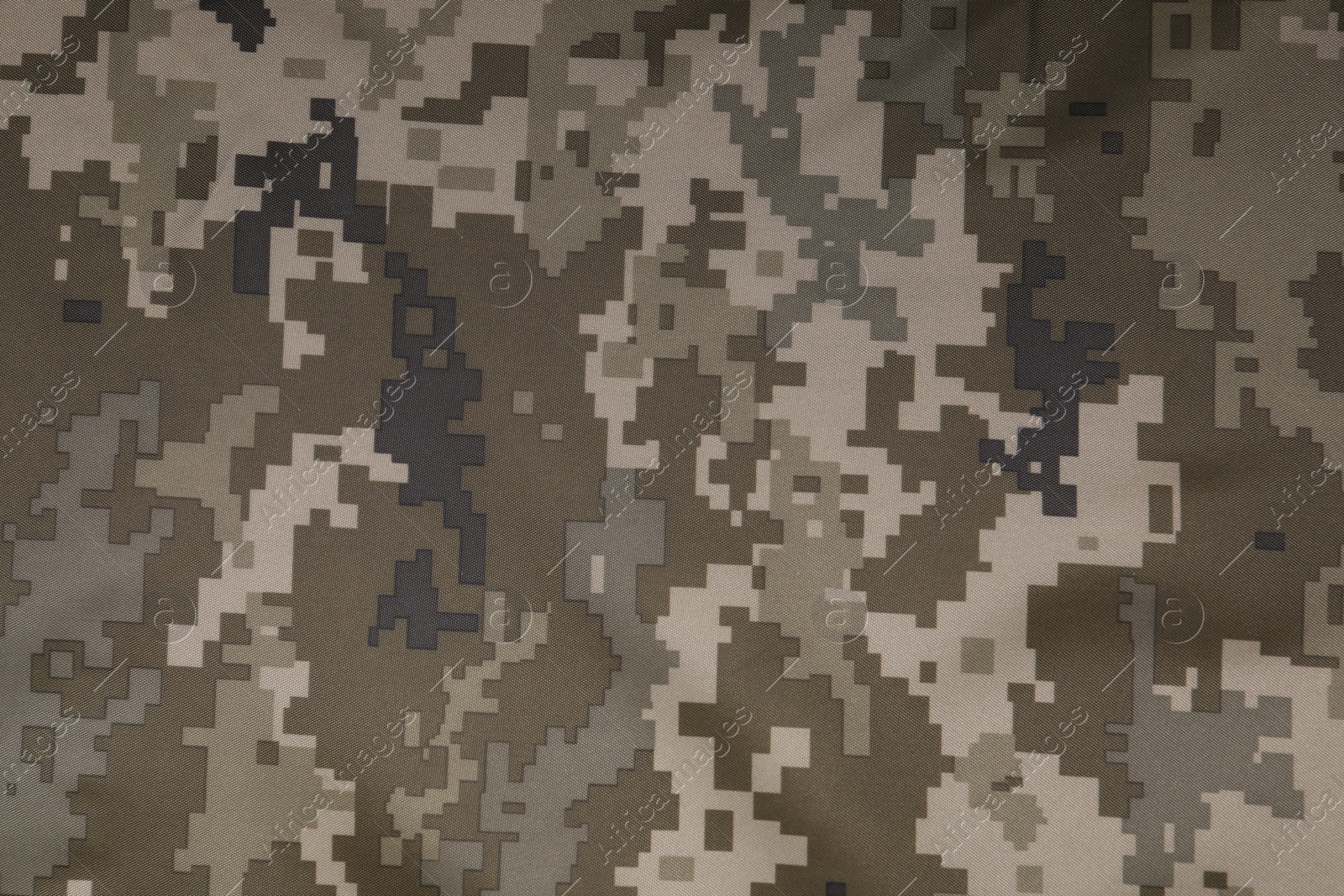 Photo of Texture of camouflage fabric as background, top view