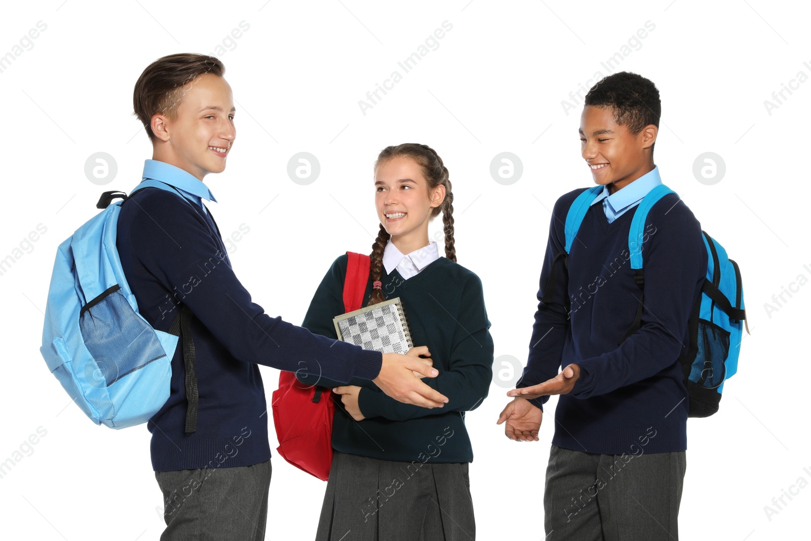 Photo of Teenagers in stylish school uniform on white background