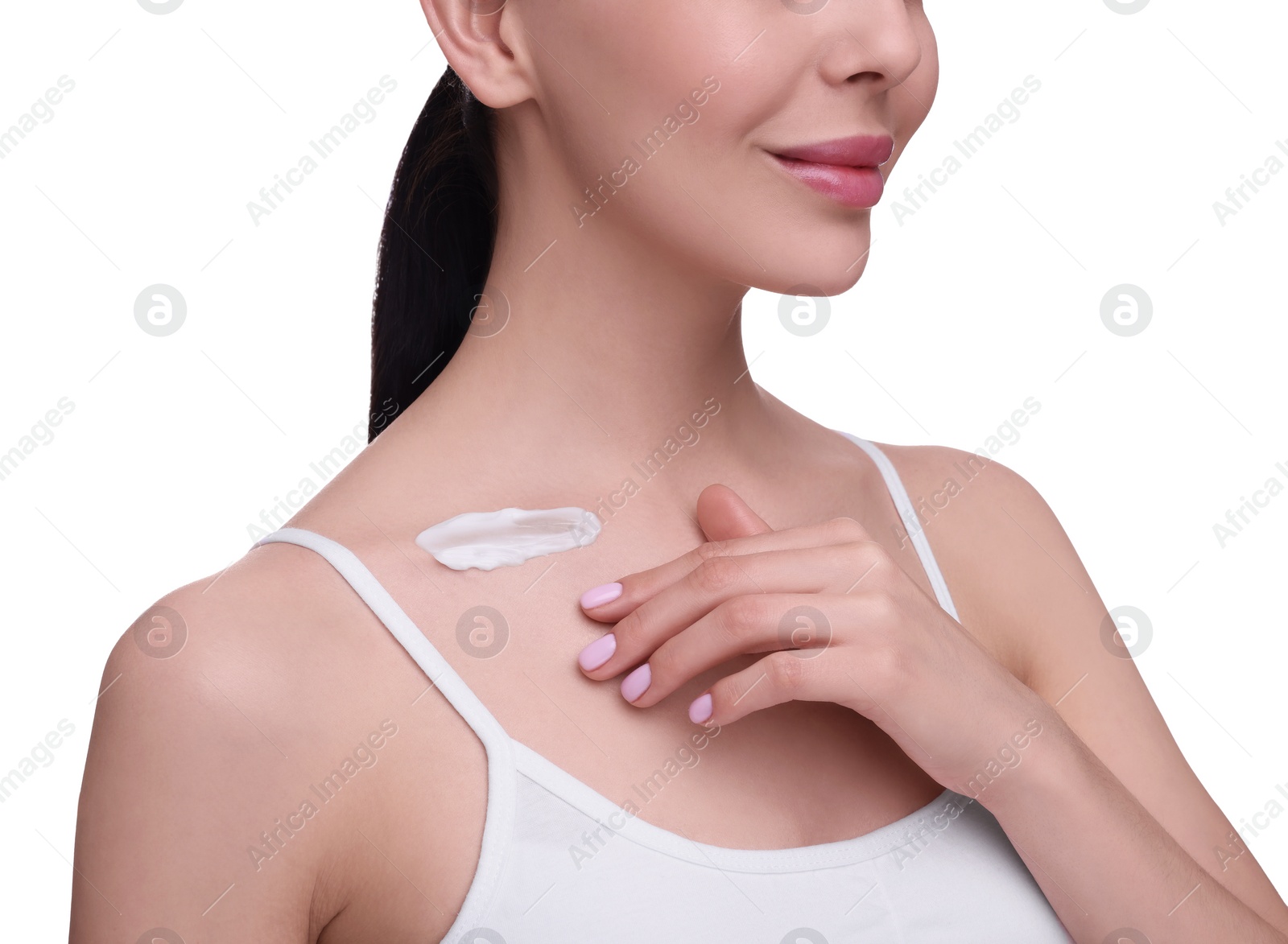 Photo of Woman with smear of body cream on her collarbone against white background, closeup