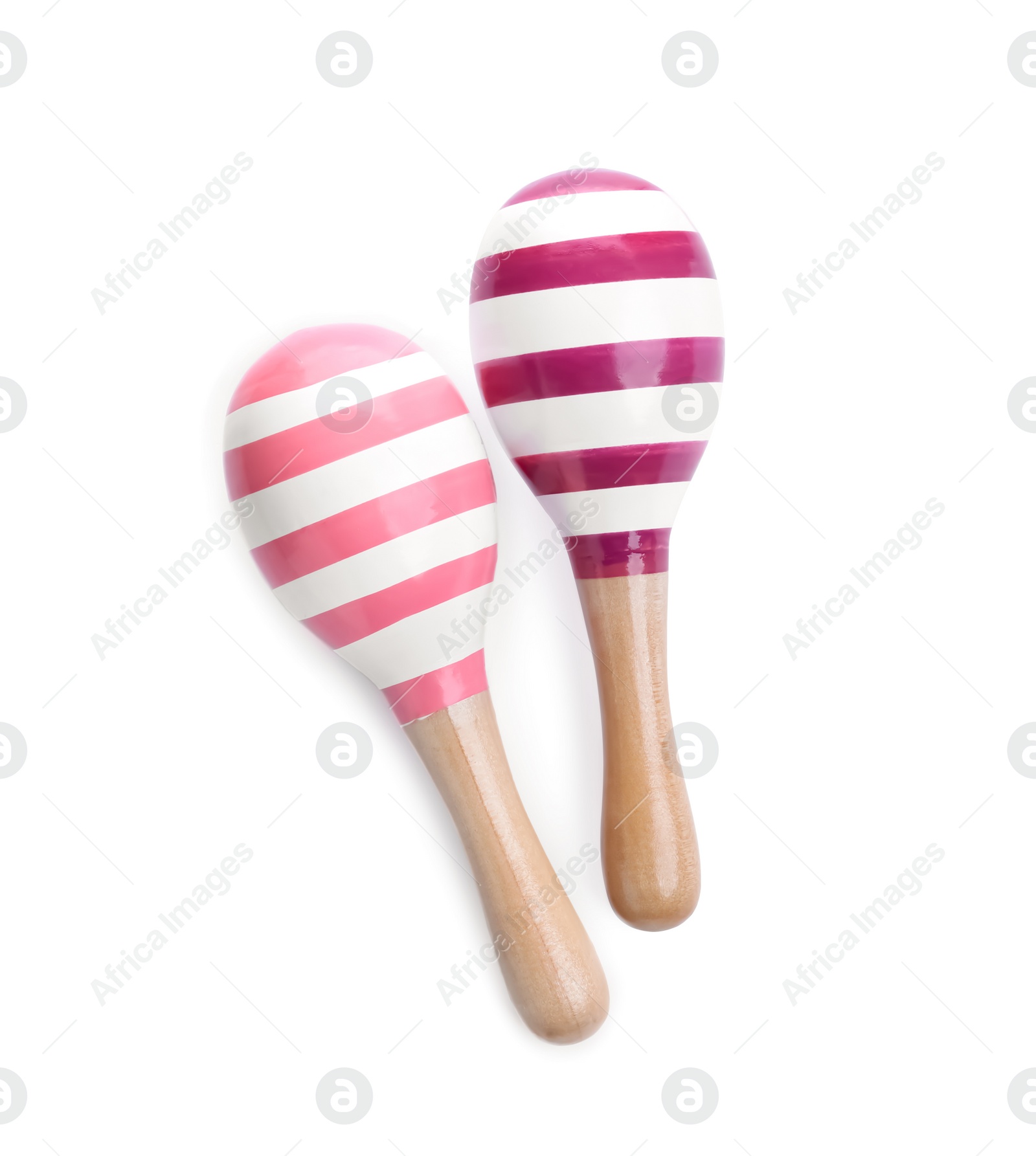 Photo of Wooden toy maracas on white background, top view