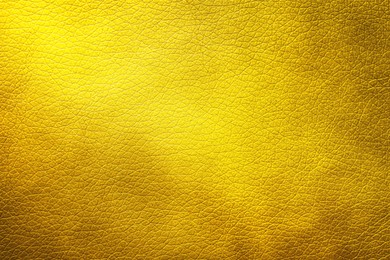 Image of Golden textured surface as background, closeup view