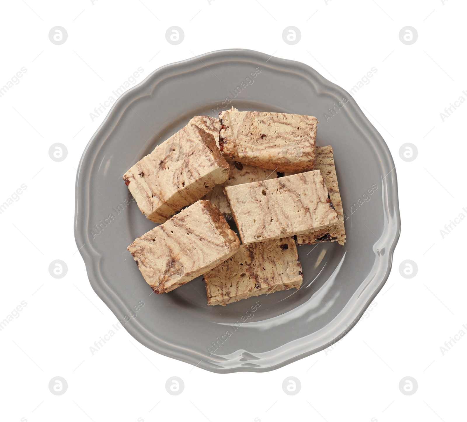 Photo of Pieces of tasty chocolate halva isolated on white, top view