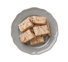 Photo of Pieces of tasty chocolate halva isolated on white, top view